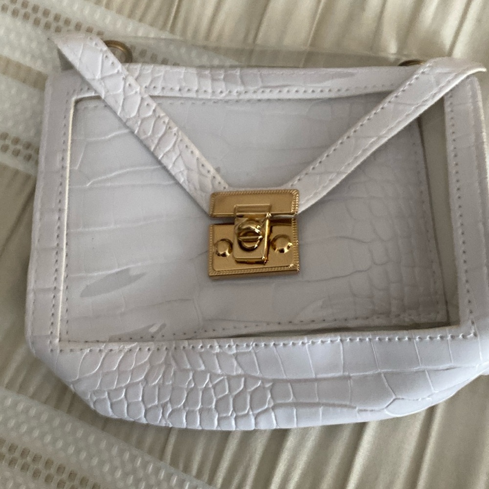 A white vegan bag, see-through front and back